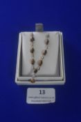 Sterling Silver necklace with Tiger’s Eye Gemstones