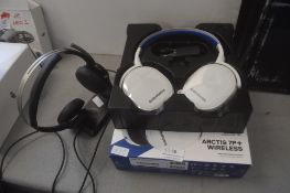 * Two pairs of headphones by Steel Series and Plantronics