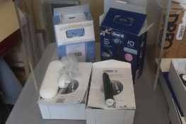 * Four Oral B electric toothbrushes AF all sold as salvage spares and repairs