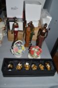 Decorative Ornaments Including Flower Posies, Buddhas, and Ethnic Figures