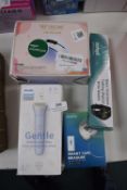 * Philips Trimmer, LKE Nail Lamp, Aidapt Digital Watch, and Renpho Smart Tape Measure