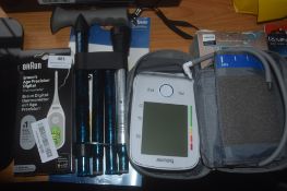 * Braun Thermometer, Braun Blood Pressure Monitor & Folding Walking stick