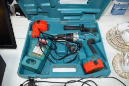 Makita Drill with 2x Batteries, and Charger