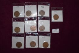 Collection of British Pennies, 1908–1964 – Ten individually housed British bronze pennies,