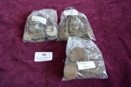 A quantity of Elizabeth II pre-decimal British coins contained in three bags, including pennies,