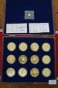 Queen Elizabeth II Memorial Commemorative Coin Collection – A cased twelve-piece commemorative