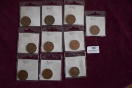 Collection of British Pennies, 1910–1967 – Nine individually housed British bronze pennies,