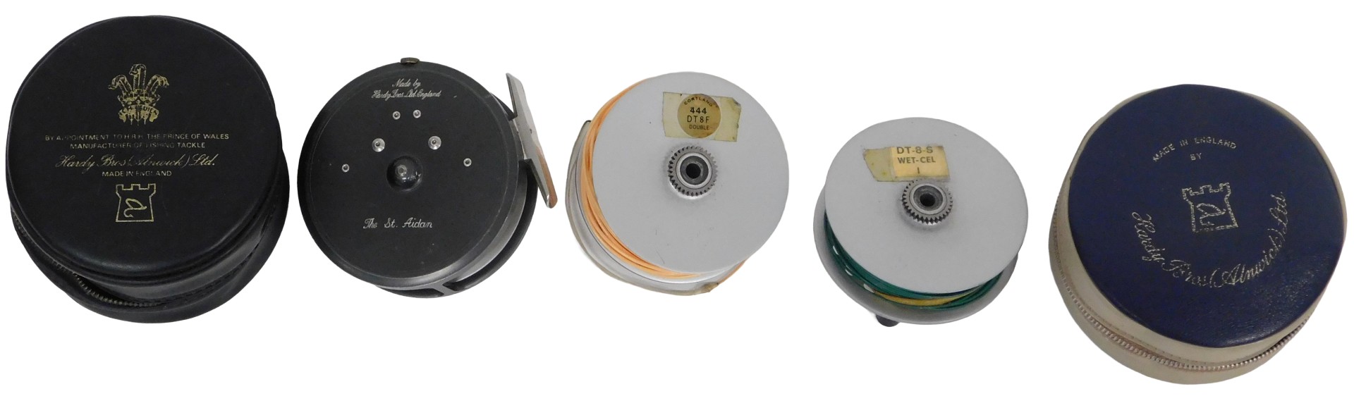 A Hardy Bros Ltd St Aidan fly reel, 9.5cm diameter, with two spare spools and two padded cases.
