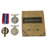 Two Second World War 1939-45 Campaign medals, in a Germany book on German culture, history and