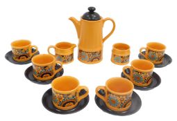 A Sadler Pottery part coffee service, decorated with flowers against an orange ground, comprising