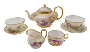 An unusual 1920s part tea service, each piece hand painted with summer flowers, fruits and