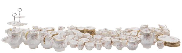 A comprehensive Paragon Victoriana Rose pattern dinner service, to include three piece graduated