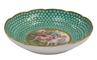 A late 18thC Sevres porcelain saucer, circa 1765, painted centrally with nymphs in a woodland