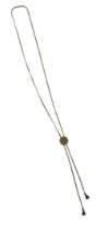 A 9ct gold pendant and chain, the snake link chain with central medallion bearing the initial D