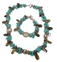 A Hi Ho Silver turquoise, smokey quartz and white metal jewellery suite, comprising a necklace and