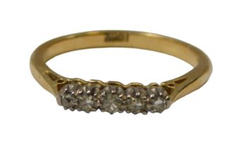 A 20thC diamond five stone dress ring, set with five round brilliant cut tiny diamonds, each in a