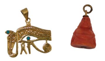 Two Eastern inspired necklaces, comprising a Pharaoh pendant with Egyptian eye and serpent, set with