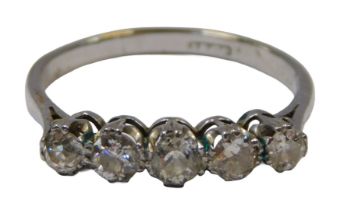A diamond five stone dress ring, set with five old mine cut diamonds, each approx 0.20ct, each