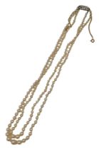 A two row cultured pearl necklace, with graduated pearls, the largest 5mm wide, the smallest 1mm