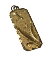A silver gilt ingot type pendant, with inscribed swallow and fern decoration, maker JRT,