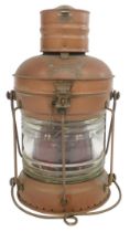 A copper and brass ship's lantern, with a brass swing handle, the body bearing plaque Not Under