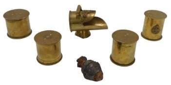 Trench art. Four lidded tobacco jars, made from World War I shells, including a 1916 dated 18pdr