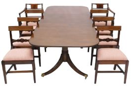 A Regency style dining room suite, comprising twin pedestal dining table, each section with triple