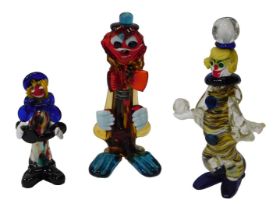 Three Murano glass clown figures, one with a label for the Venetian Glass Company, the tallest 30.