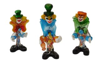 Three Murano glass clown figures, the tallest 25.5cm high.