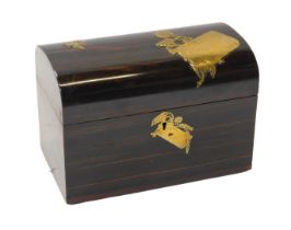 A Victorian coromandel tea caddy, of plain dome chest shaped design, the hinged lid with
