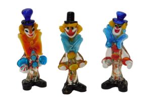 Three Murano glass clown figures, the tallest 25.5cm high.