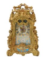 A 19thC French Louis XVI style ormolu mantel clock, with a highly ornate rococo-style case, and
