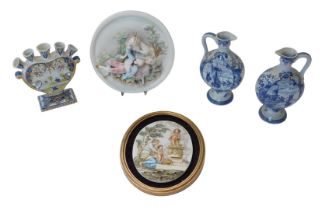 A pair of Delft blue and white transfer printed ewers, decorated with scenes of shipping and