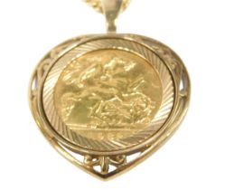 An Elizabeth II full gold sovereign pendant and chain, dated 1982, in 9ct gold heart shaped and
