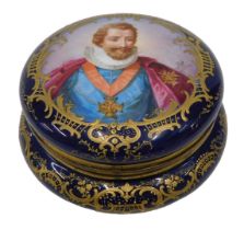 An early 19thC Sevres porcelain box, of circular form, the hinged lid expertly decorated with a