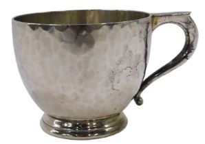 A George V silver overlaid cup, of circular form, with shaped handle, on circular foot, by Wilson