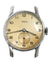 A Tudor wristwatch head, with a cream coloured numeric dial and seconds dial, with white painted