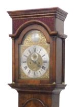 A fine 18thC brass faced longcase clock, the arched dial with raised plaque, signed Obediah Cluer,