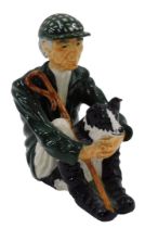 A Shebeg Isle of Man J Firth figure of a shepherd and sheep dog, 14cm high.