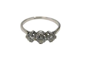 A three stone diamond dress ring, set with three round brilliant cut diamonds, the centre stone 4.