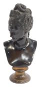 After Jean Goujon. Diane de Poitiers, a brown patinated bronze bust, raised on a gilt socle base,
