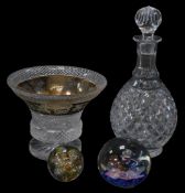A group of glassware, comprising a moulded glass bottle shaped decanter and stopper, 37cm high,