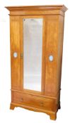 A Victorian satin walnut wardrobe, with satinwood crossbanding and boxwood and ebony line inlay, the