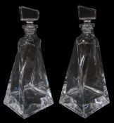 A pair of Crystalite Bohemia Lovers cut glass spirit decanters, 27.5cm high.
