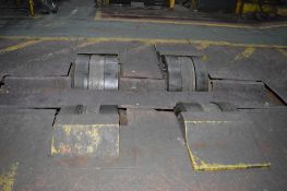 Pair of powered turning rolls (sunken into floor)