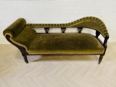 An Edwardian carved mahogany chaise longue