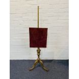 An attractive 19th century carved giltwood polescreen