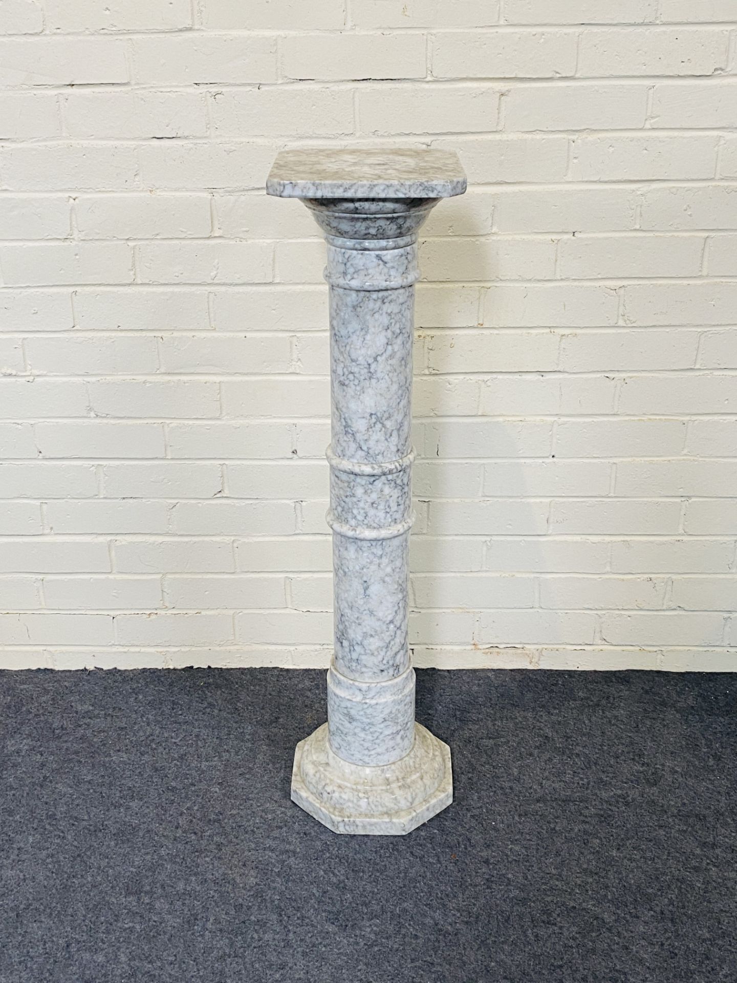 A good turned marble display column