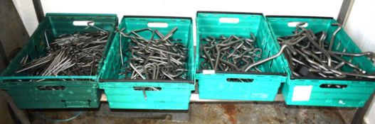 Large Collection of a Stainless Steel Meat Hooks - Includes Four Crates with Contents