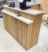 1 x Bespoke White Quartz Topped 2-Level 1.8m Retail Counter / Reception Desk with Slatted Frontage
